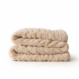 The SnuggleStretch™ Blanket in 'Very Demure'