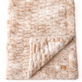 The SnuggleStretch™ Blanket in 'Burnt-Out Millennial'