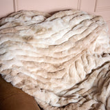 The SnuggleStretch™ Blanket in 'Burnt-Out Millennial'