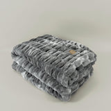 The SnuggleStretch™ Blanket in 'A Blighty Summer'