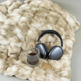 The SnuggleStretch™ Blanket in 'Burnt-Out Millennial'