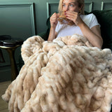 The SnuggleStretch™ Blanket in 'Burnt-Out Millennial'