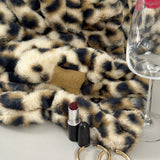 The SnuggleStretch™ Blanket in 'Dame Kat Slater'