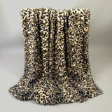 The SnuggleStretch™ Blanket in 'Dame Kat Slater'