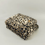 The SnuggleStretch™ Blanket in 'Dame Kat Slater'