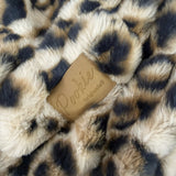 The SnuggleStretch™ Blanket in 'Dame Kat Slater'