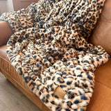 The SnuggleStretch™ Blanket in 'Dame Kat Slater'