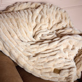 The SnuggleStretch™ Blanket in 'Very Demure'